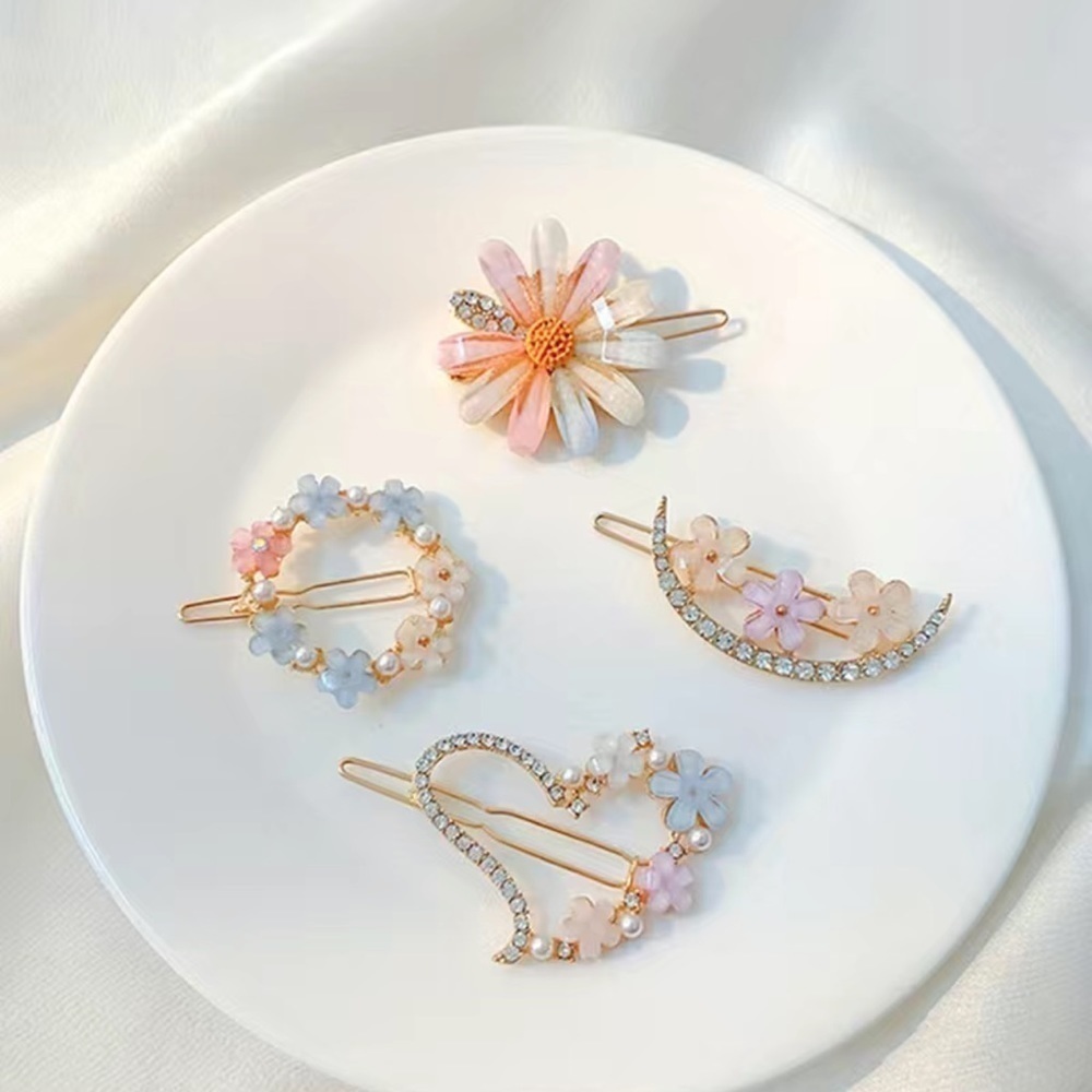 Multicolored floral hair clips 4 piece set